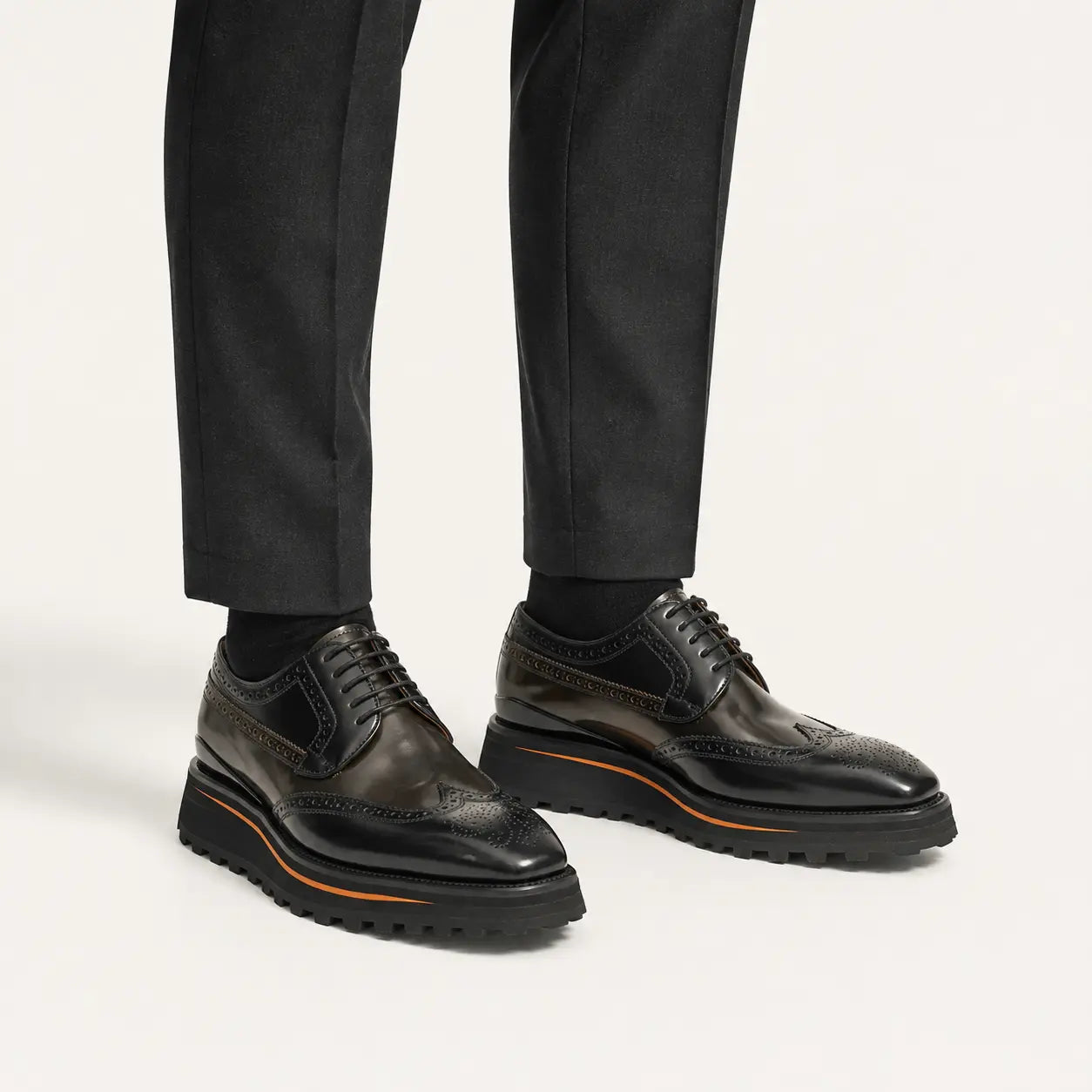 Antique Brown Wingtip Derby — on-foot studio view