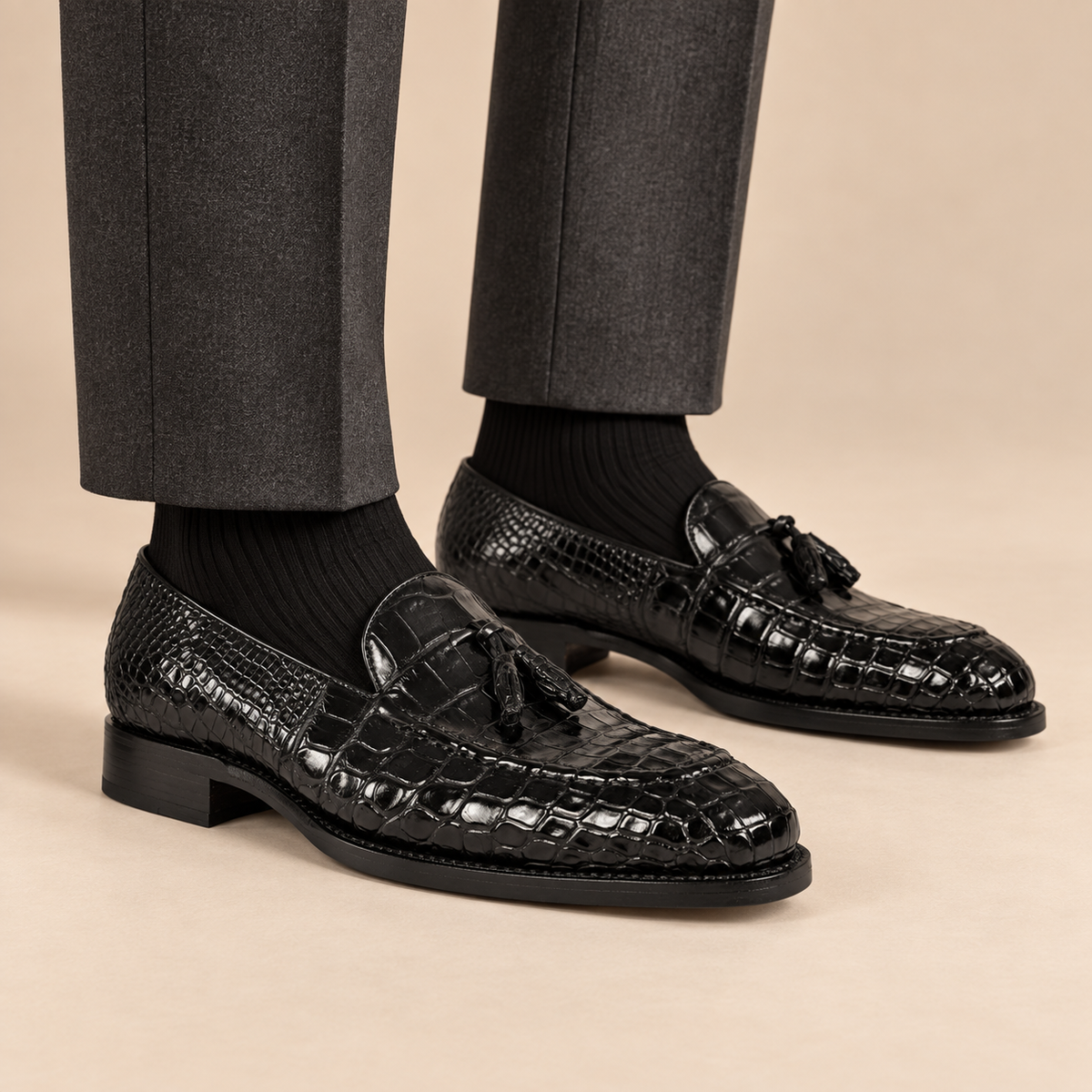 DIVINCH black scale-pattern tassel loafers with apron toe — on-foot studio hero