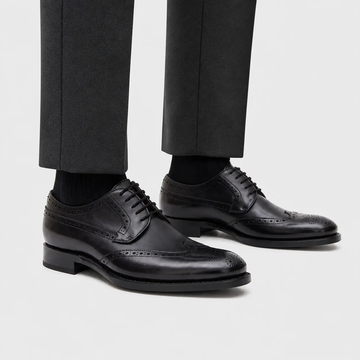 Black Brogue Derby Shoe on-foot studio view