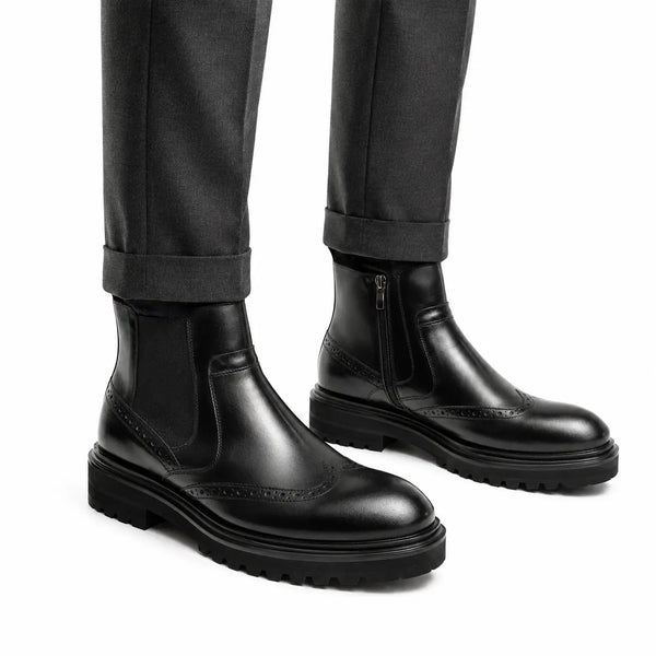 Stivali Chelsea neri brogue con suola carrarmato