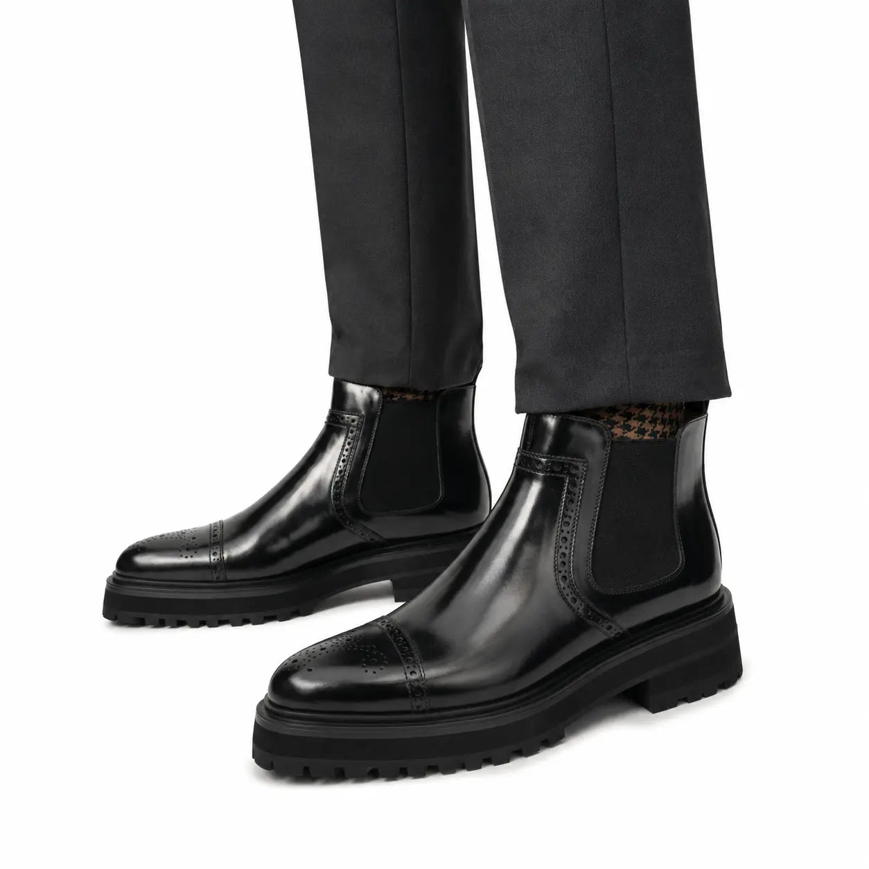 Botines Chelsea brogue wingtip negros con plataforma