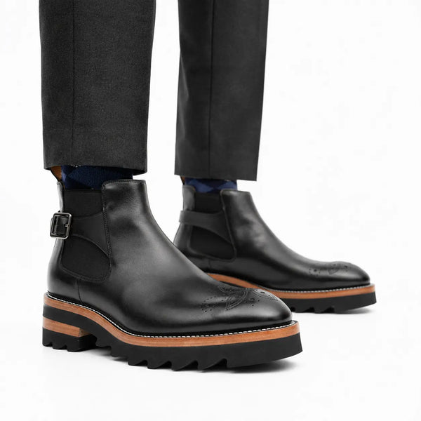 Botins Chelsea pretos com fivela