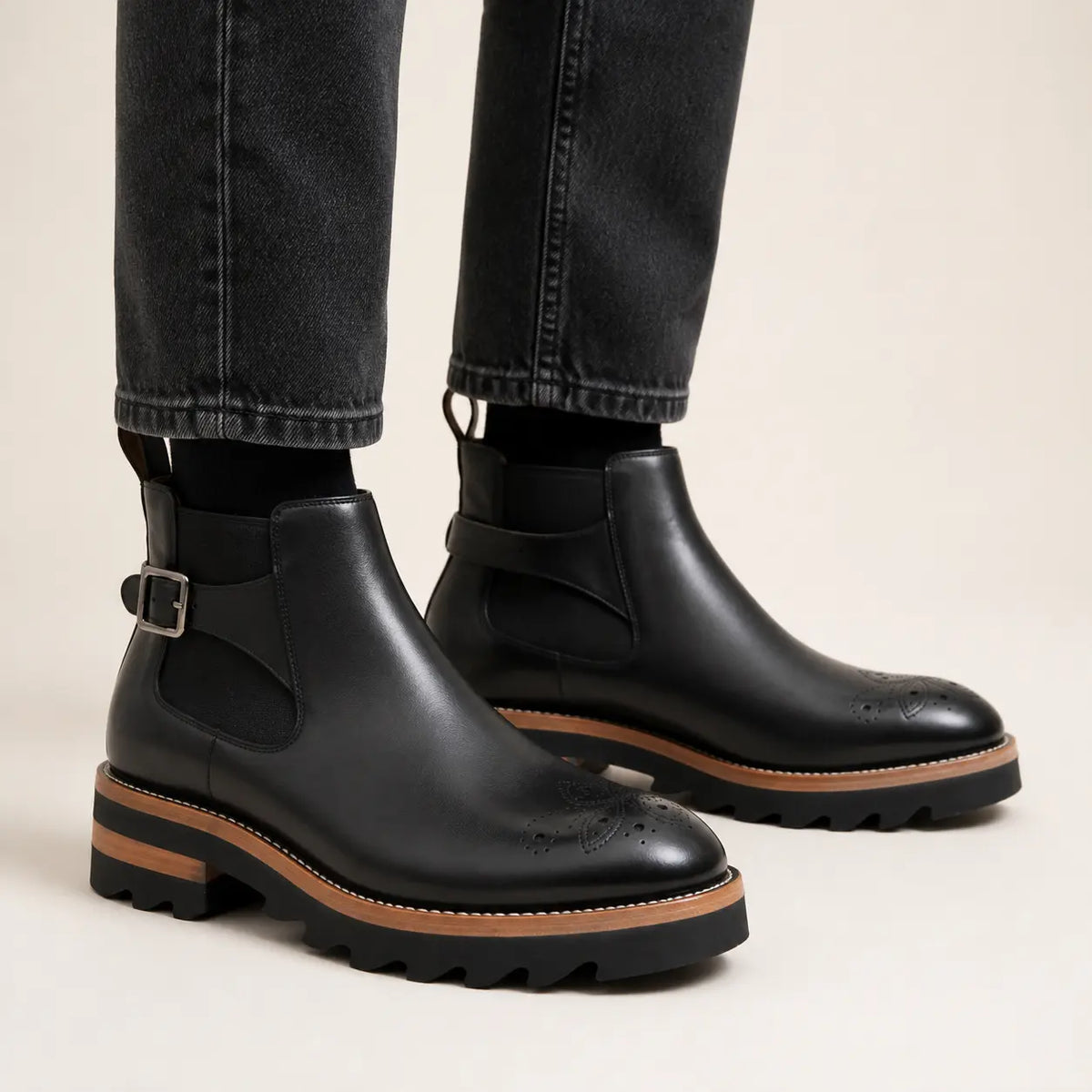 Black Buckled Chelsea Boots — on-foot studio view