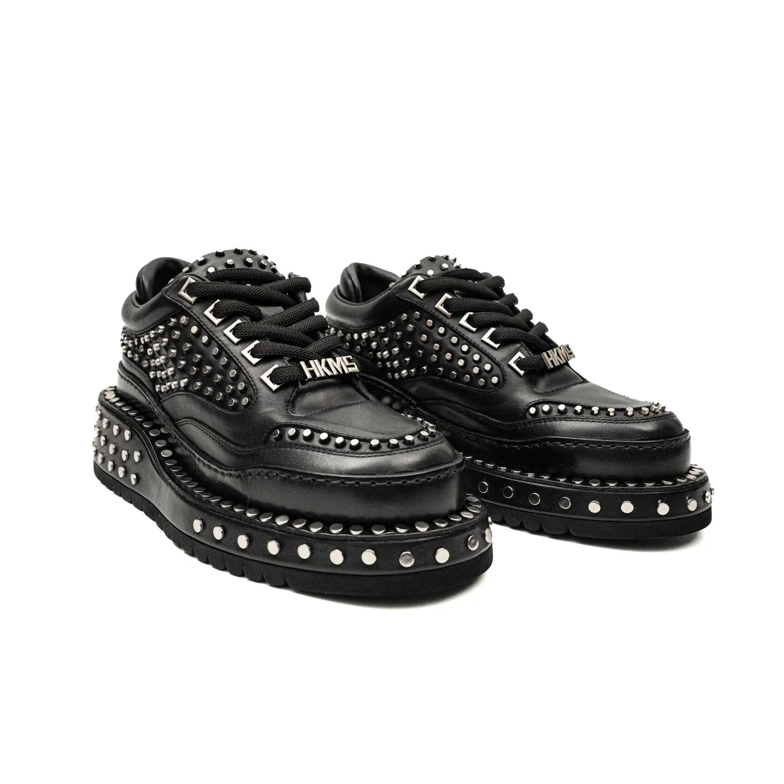 أحذية رياضية منصة ثقيلة المزينة بجلد العجل الأسود