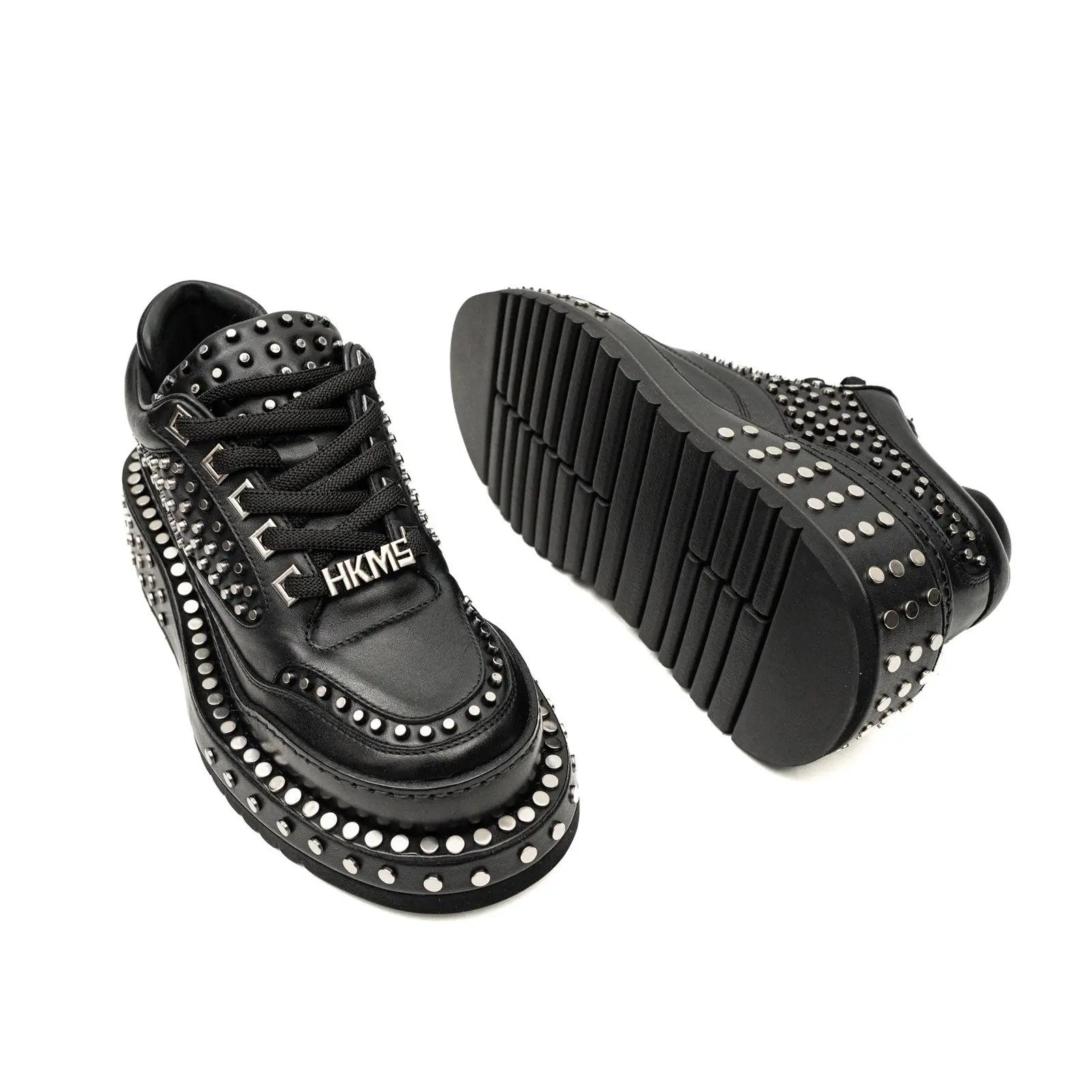 أحذية رياضية منصة ثقيلة المزينة بجلد العجل الأسود