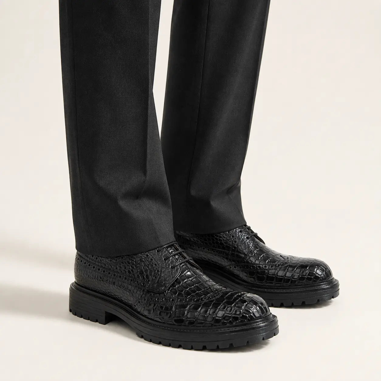 Black Croc-Embossed Derby on foot, warm off-white studio