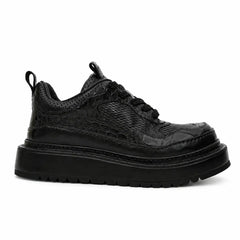 Sneaker con plateau nero effetto coccodrillo