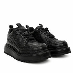 Sneaker con plateau nero effetto coccodrillo