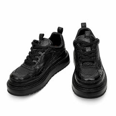 Sneaker con plateau nero effetto coccodrillo