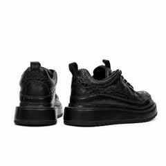 Sneaker con plateau nero effetto coccodrillo