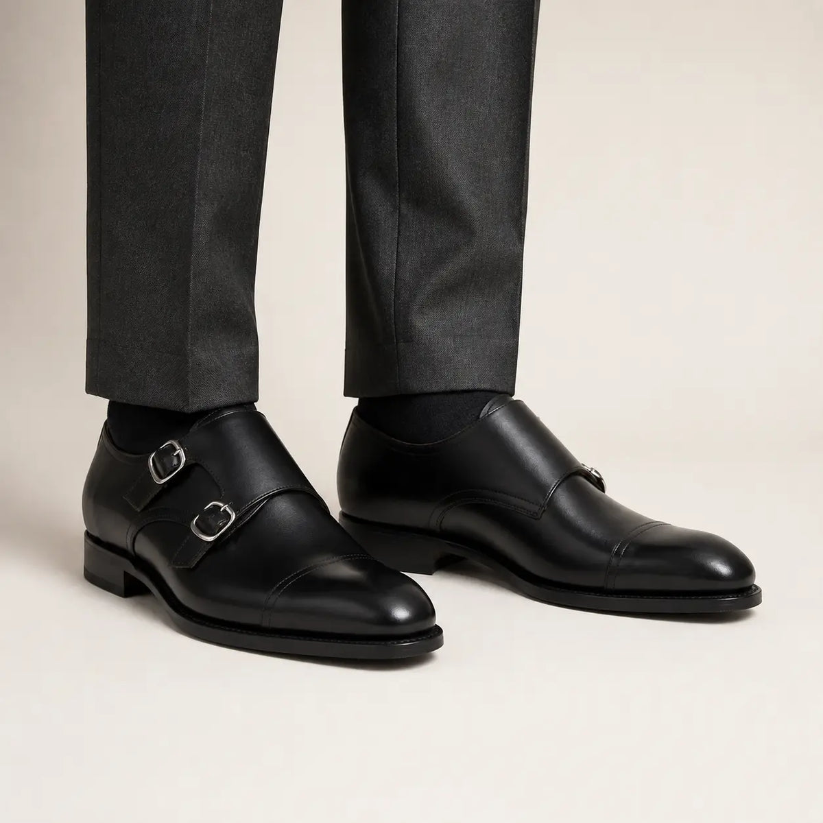 Black Double Monk Strap — on-foot studio view