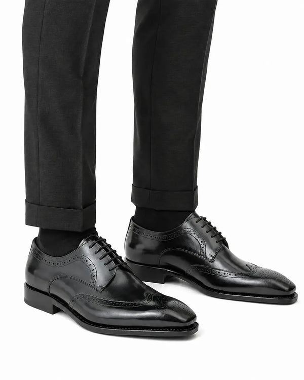 Derby Wingtip en veau noir avec semelle Goodyear