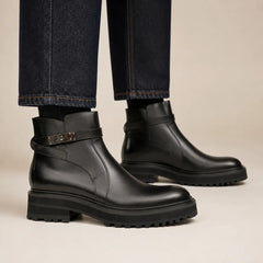 DIVINCH black leather buckle Chelsea boot on foot — warm studio side profile
