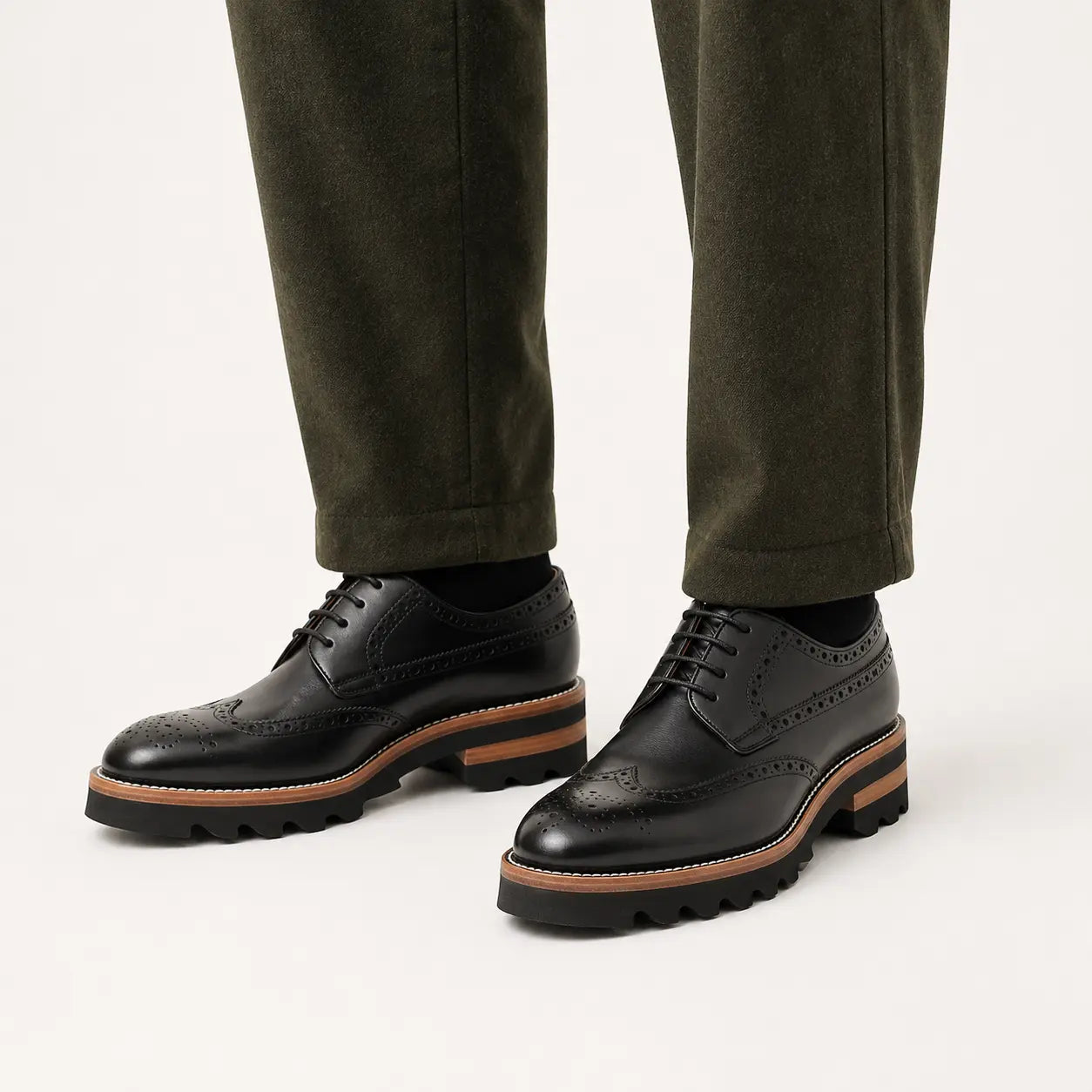 DIVINCH Black Lug Sole Brogue Derby — on-foot studio view