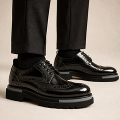DIVINCH black polished lug-sole brogue Derby shoes worn on foot