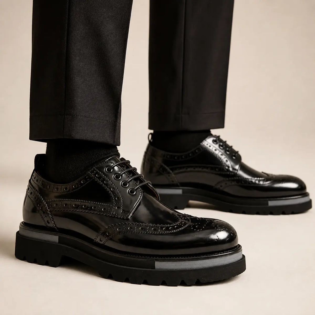 DIVINCH black polished lug-sole brogue Derby shoes worn on foot