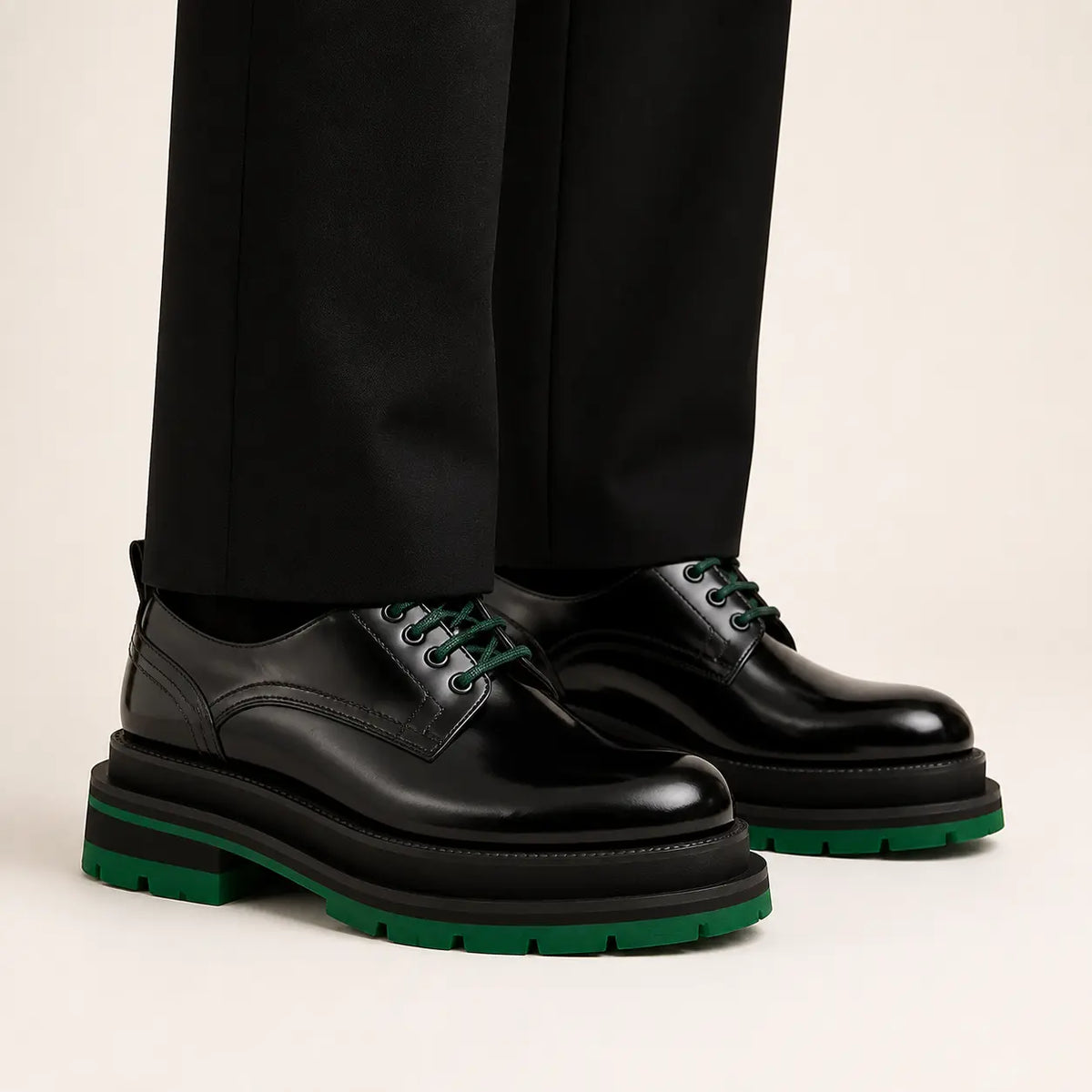 DIVINCH black patent derby shoes with green laces on foot in warm studio