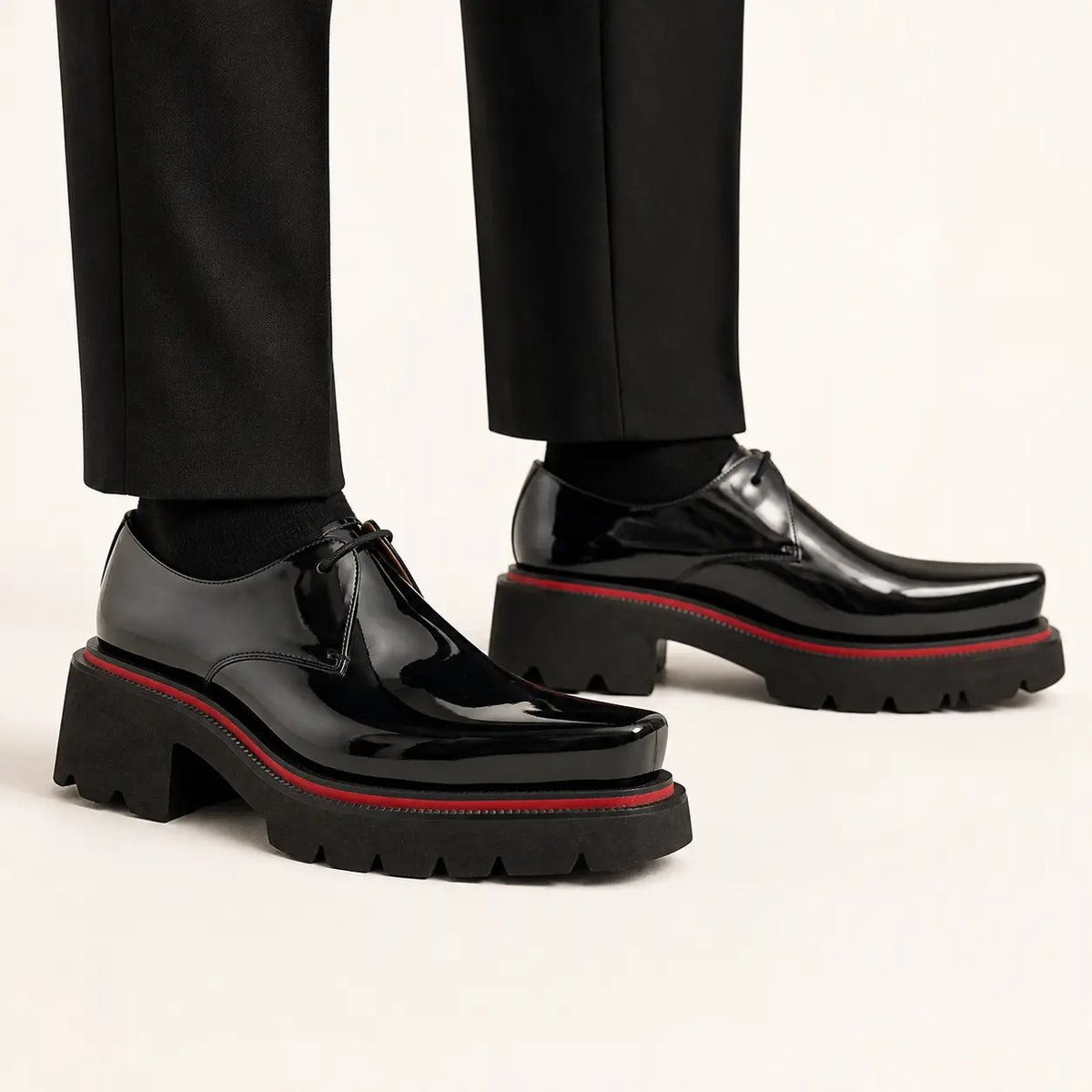 Black Patent Lug Derby — on-foot studio view