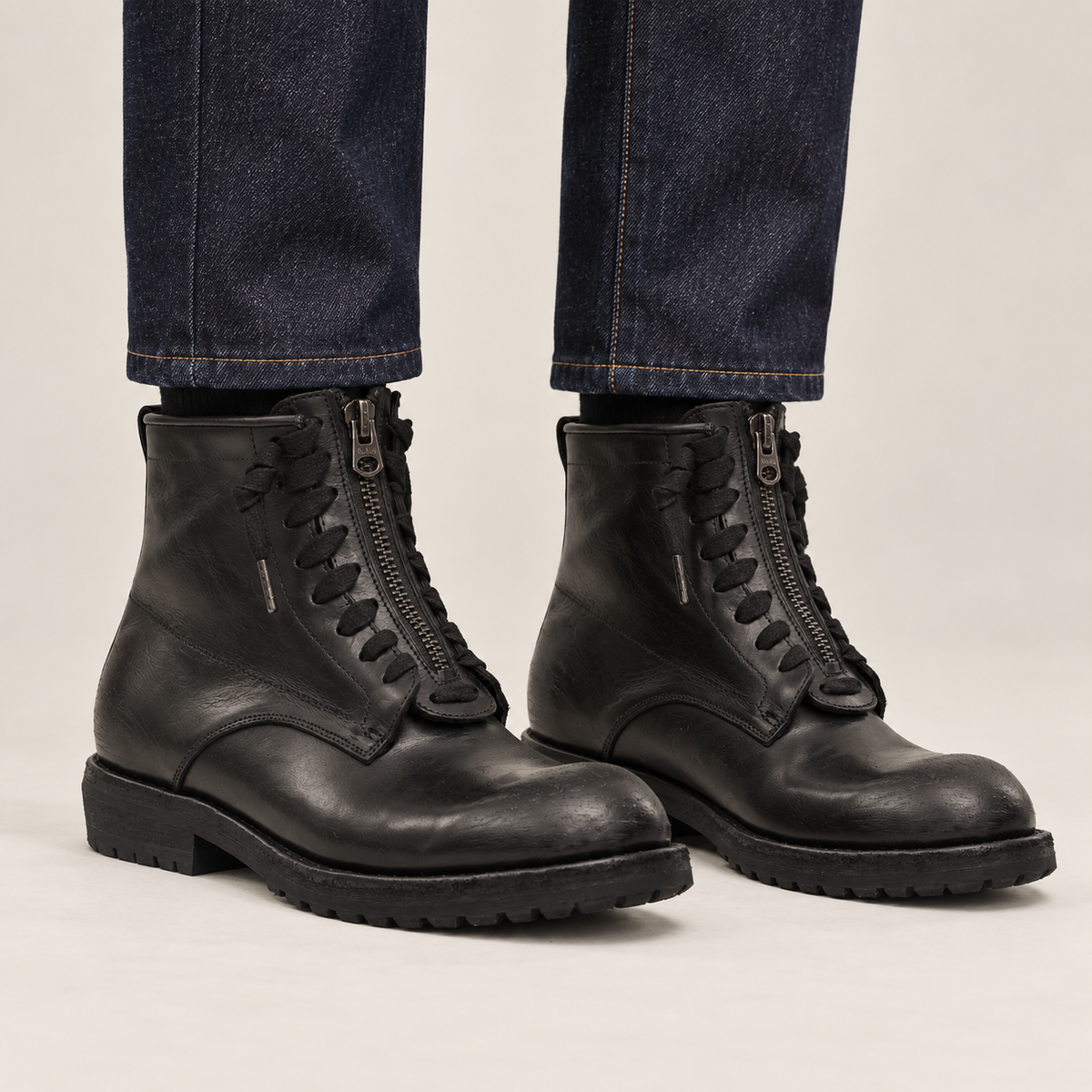 DIVINCH 5106B black calf leather front-zip lug-sole ankle boots on foot