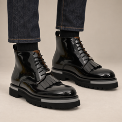 DIVINCH black glossy plain-toe fringe ankle boots worn with raw indigo denim