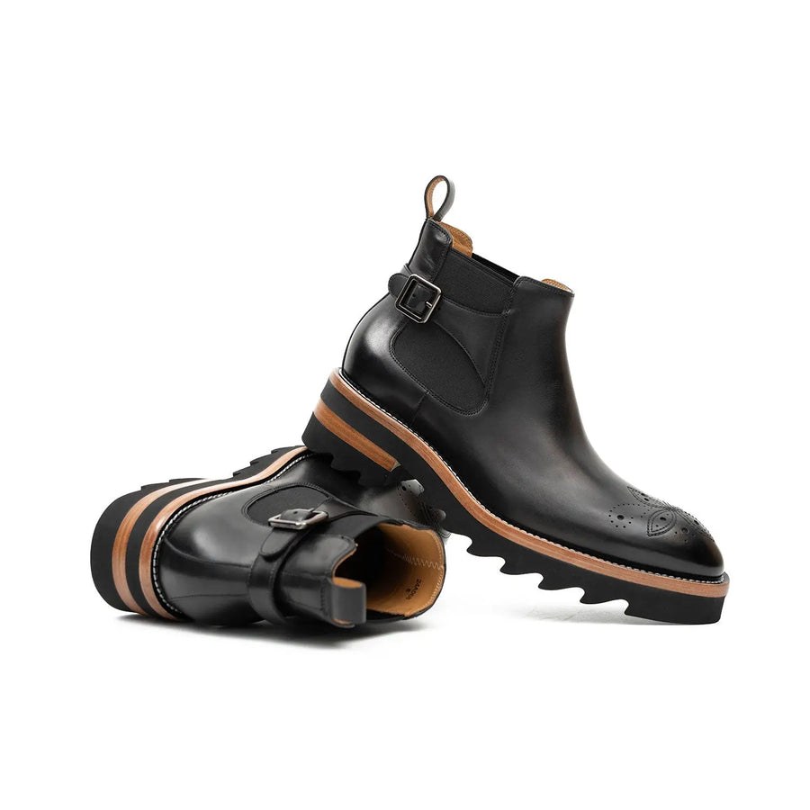 Stivali Chelsea wingtip in pelle di vitello nera
