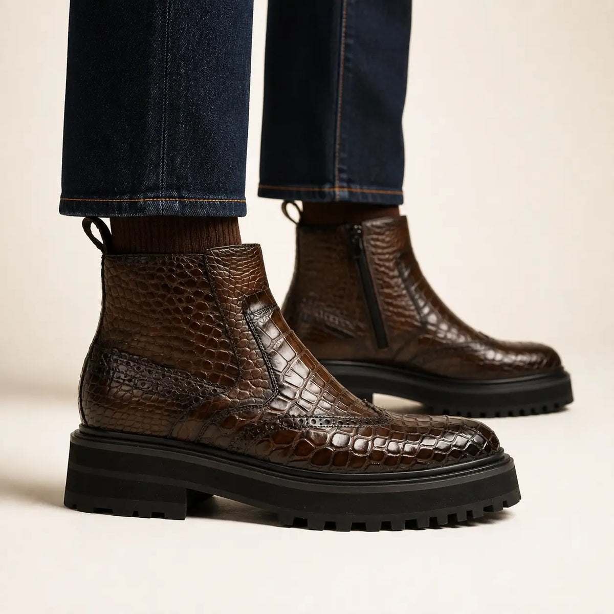 DIVINCH coffee-brown crocodile Chelsea lug boot on foot — warm studio side profile