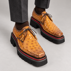 Amber ostrich-texture Derby shoes on foot