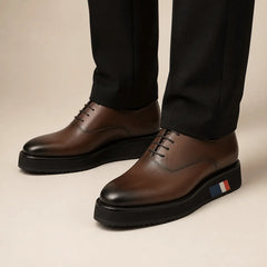 Brown Oxford with Black Sole — on-foot studio view