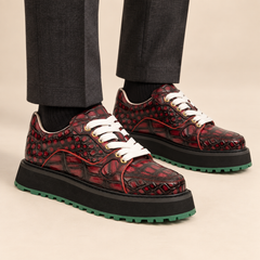 Burgundy red and black platform apron-toe sneaker on foot