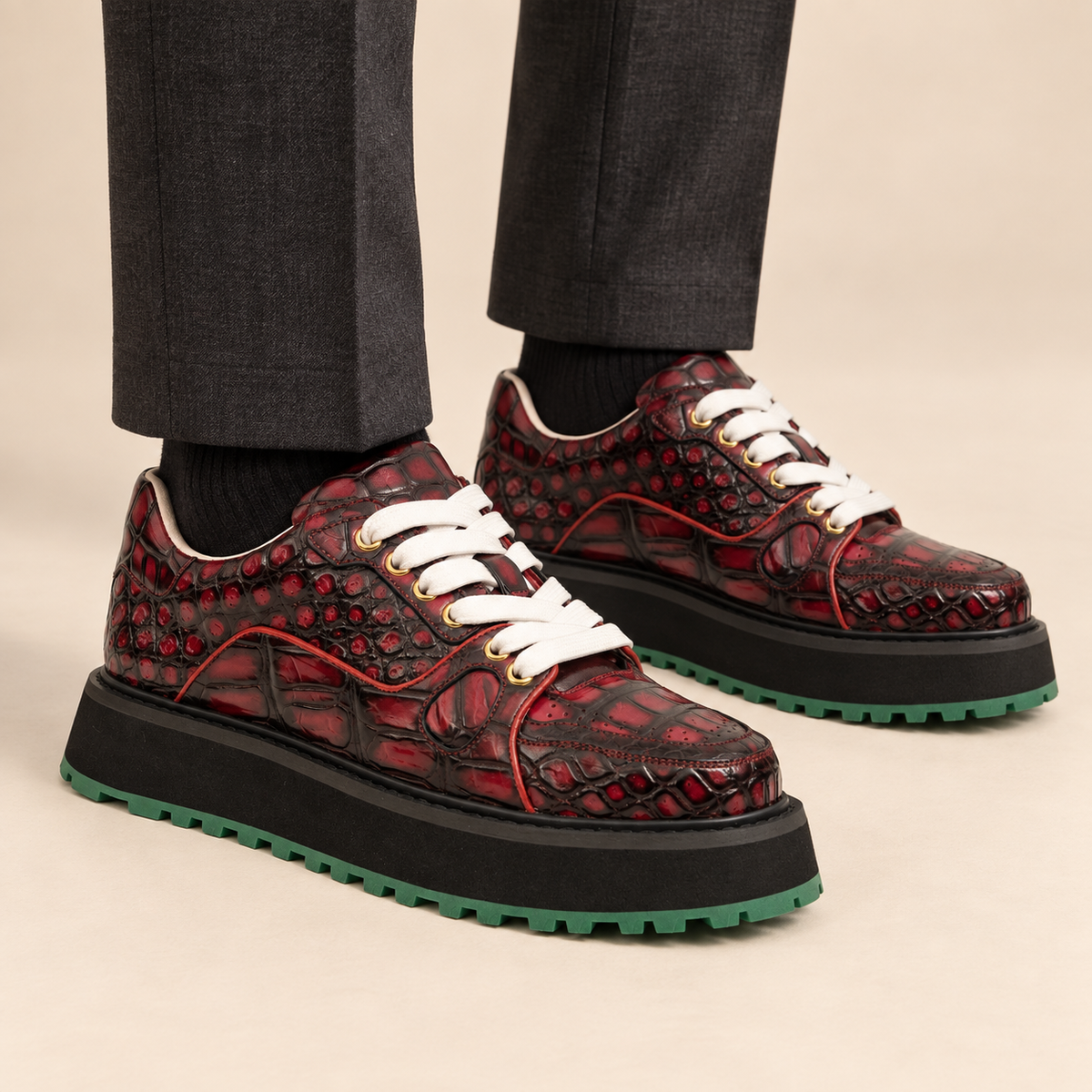 Burgundy red and black platform apron-toe sneaker on foot