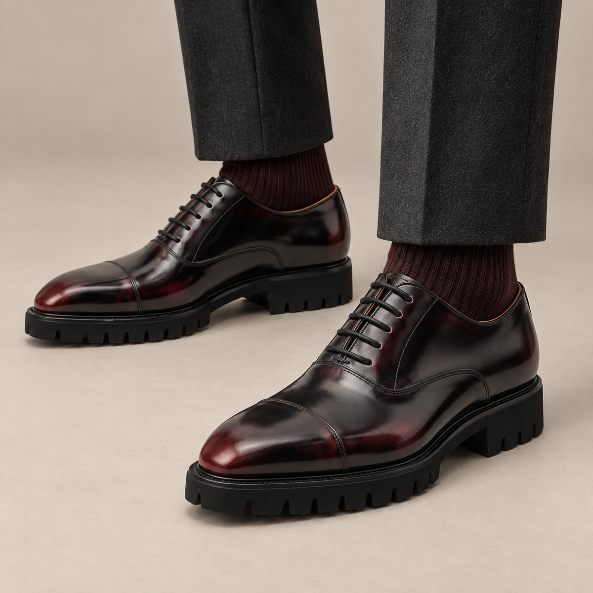 DIVINCH burgundy-shaded black glossy lug-sole cap-toe Oxford shoe on foot