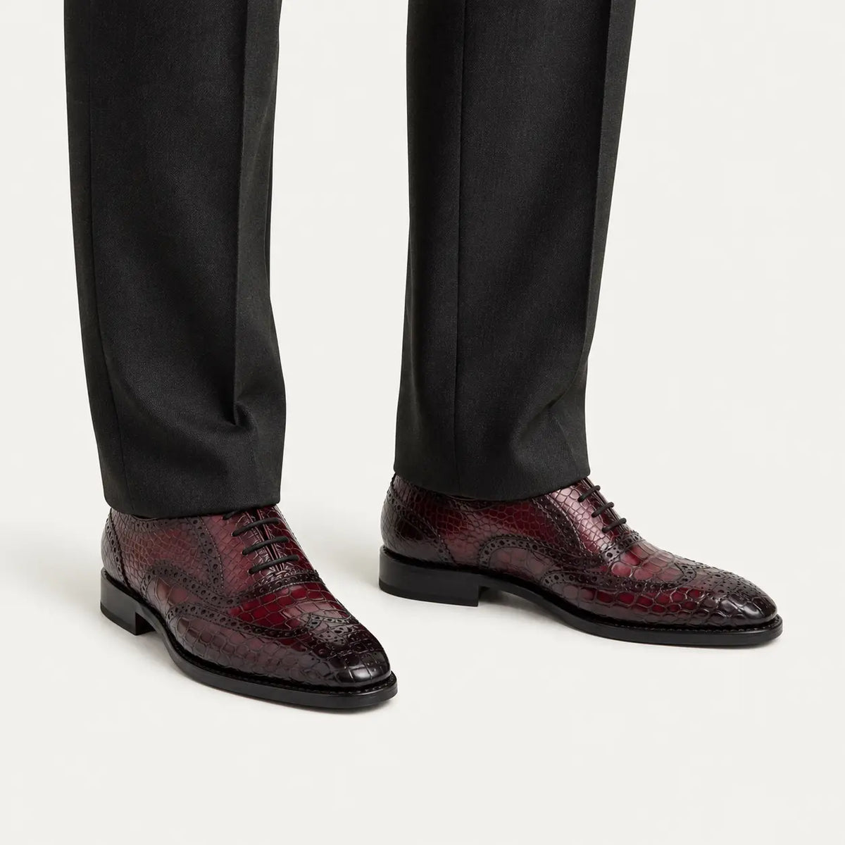 Burgundy Crocodile Wingtip Oxford — on-foot studio view