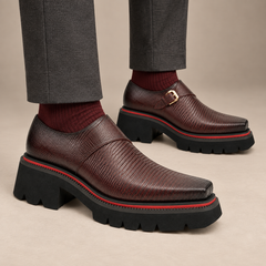 Burgundy-brown textured single-buckle monk shoes on foot