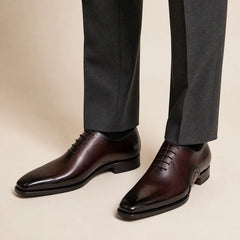 DIVINCH burgundy medallion Oxford shoes on foot with charcoal trousers