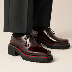Burgundy Patent Platform Derby — on-foot studio view