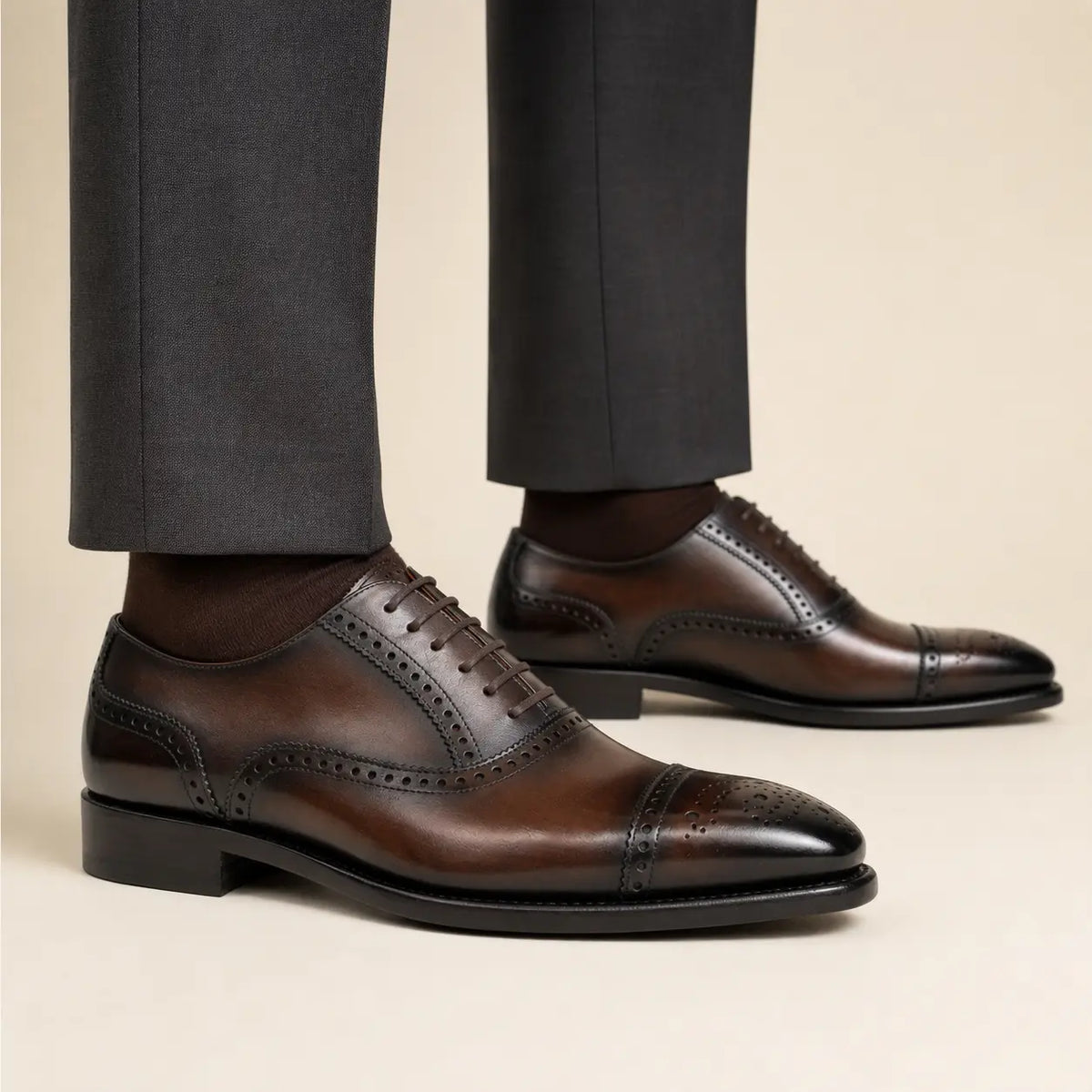 DIVINCH burnished brown medallion cap-toe Oxford on foot — warm studio side profile