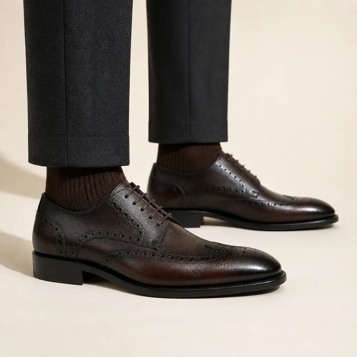 DIVINCH burnished brown wingtip Derby on foot — warm studio side profile