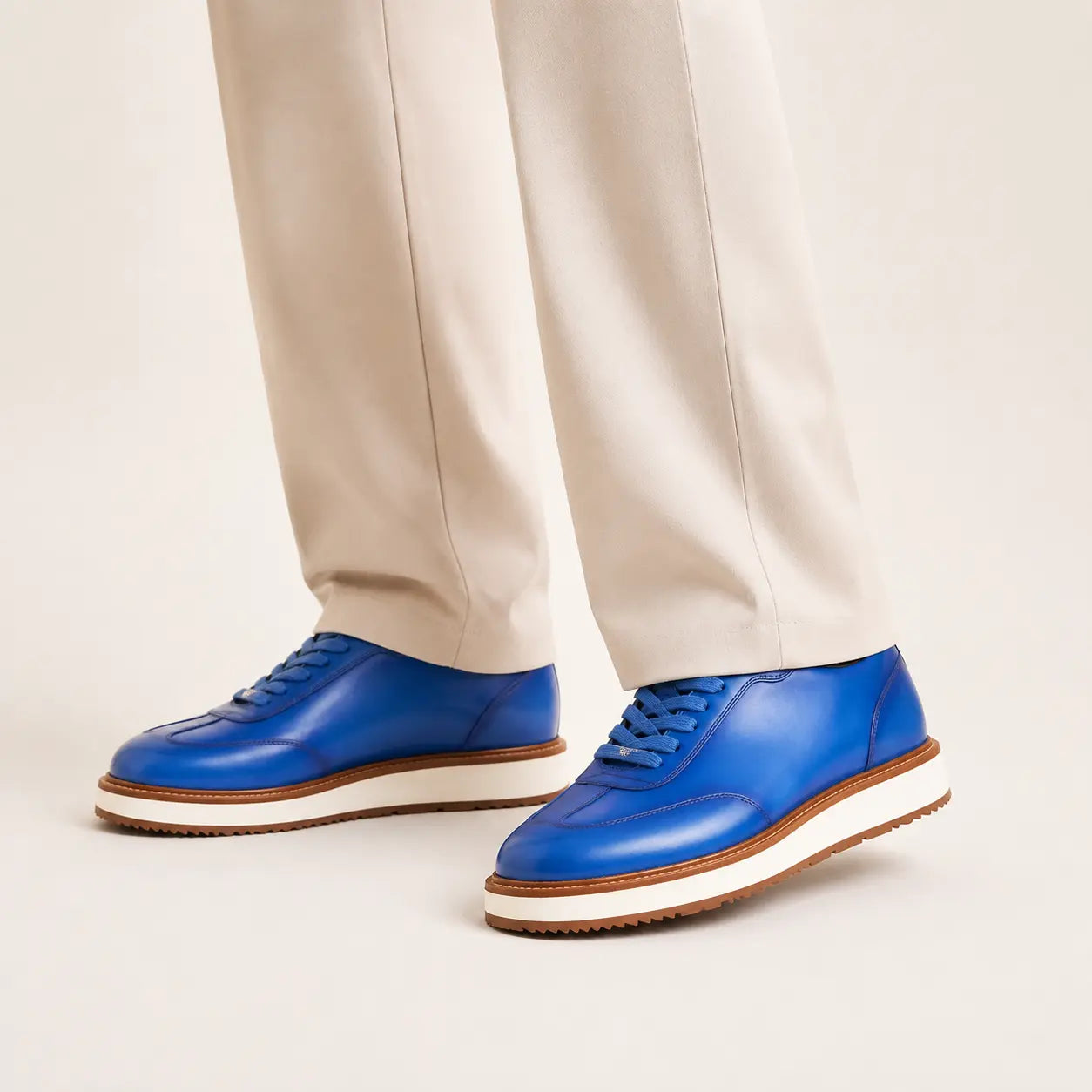 DIVINCH burnished cobalt platform derby sneaker on foot in warm studio
