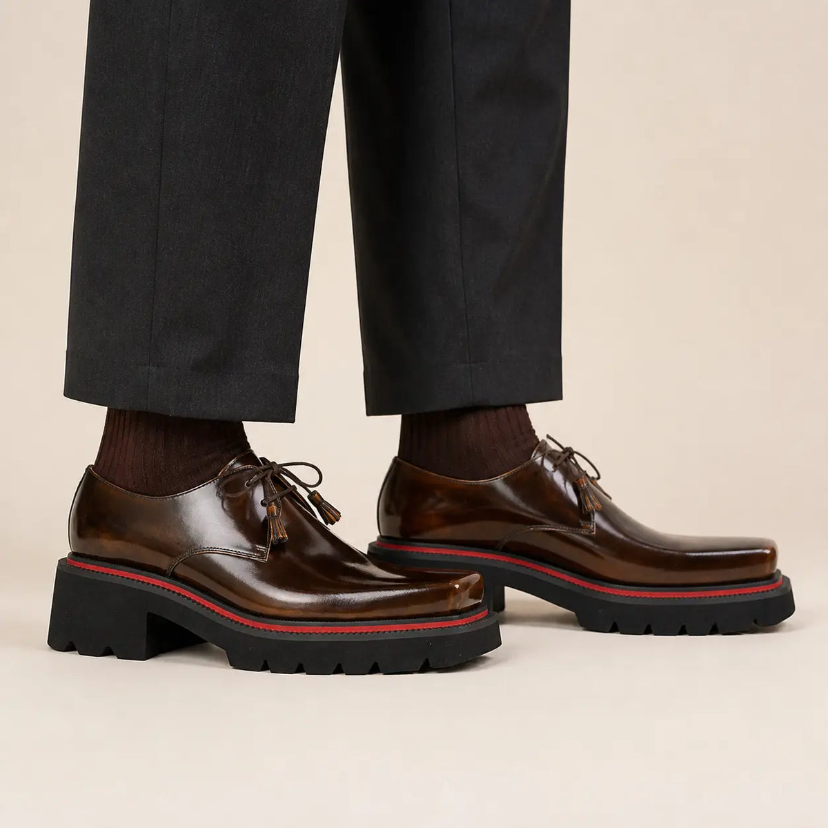 Burnished dark brown square-toe lug Derby on foot
