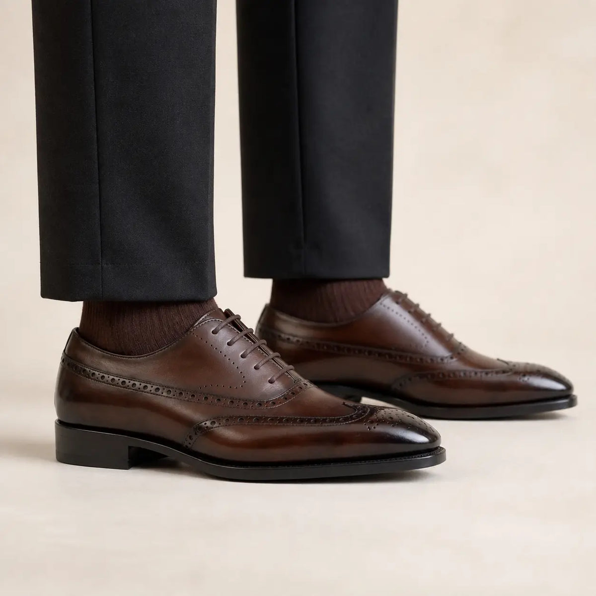 DIVINCH burnished brown wingtip Oxford on foot — warm studio side profile