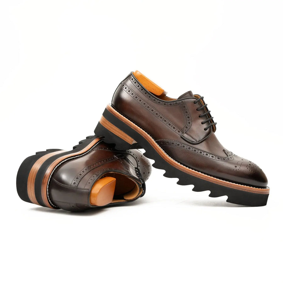 Derby brogue in vitello color cognac