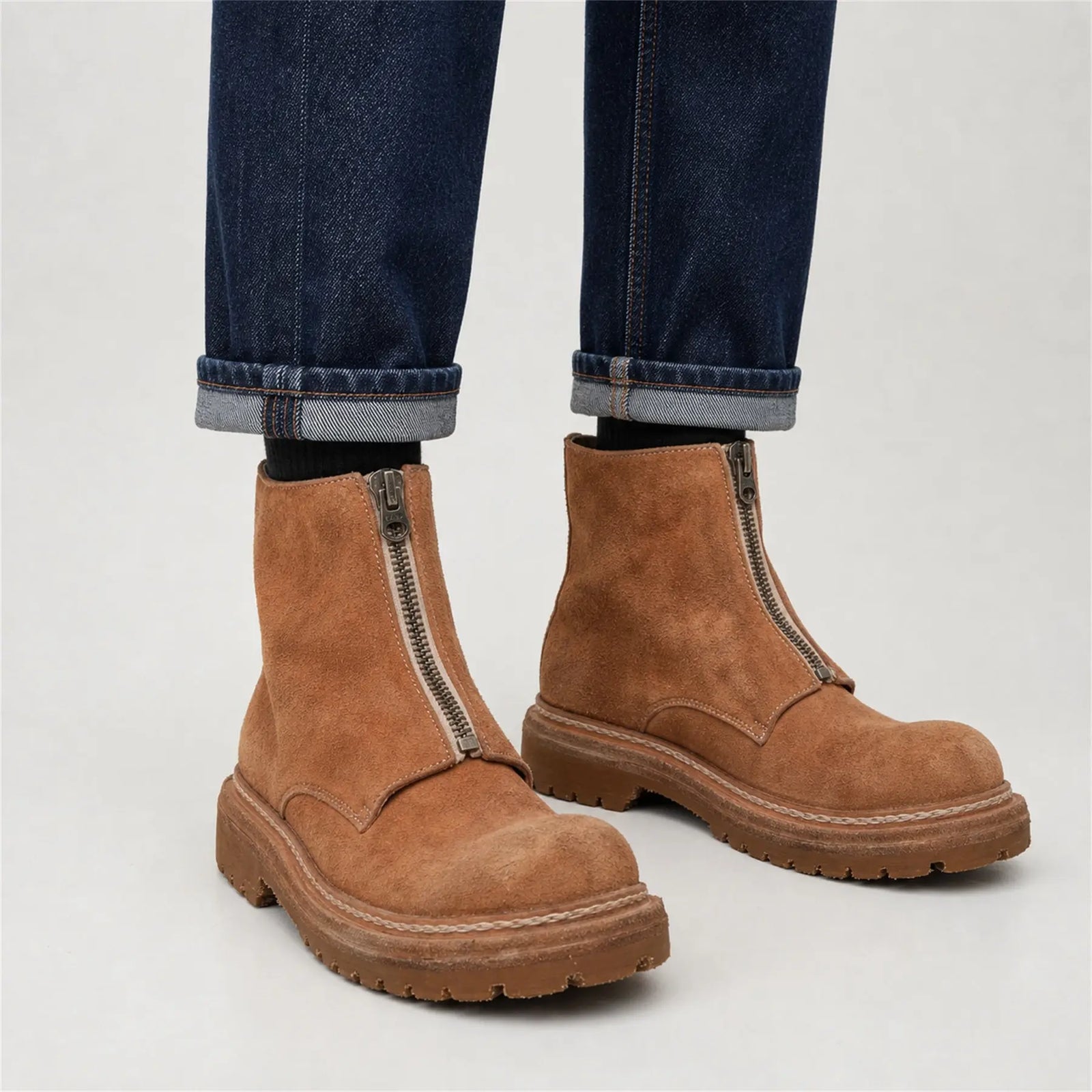 DIVINCH camel suede zip ankle boots styled with rolled dark blue denim