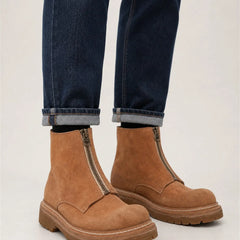 DIVINCH camel suede zip ankle boots on foot with rolled dark blue denim in studio