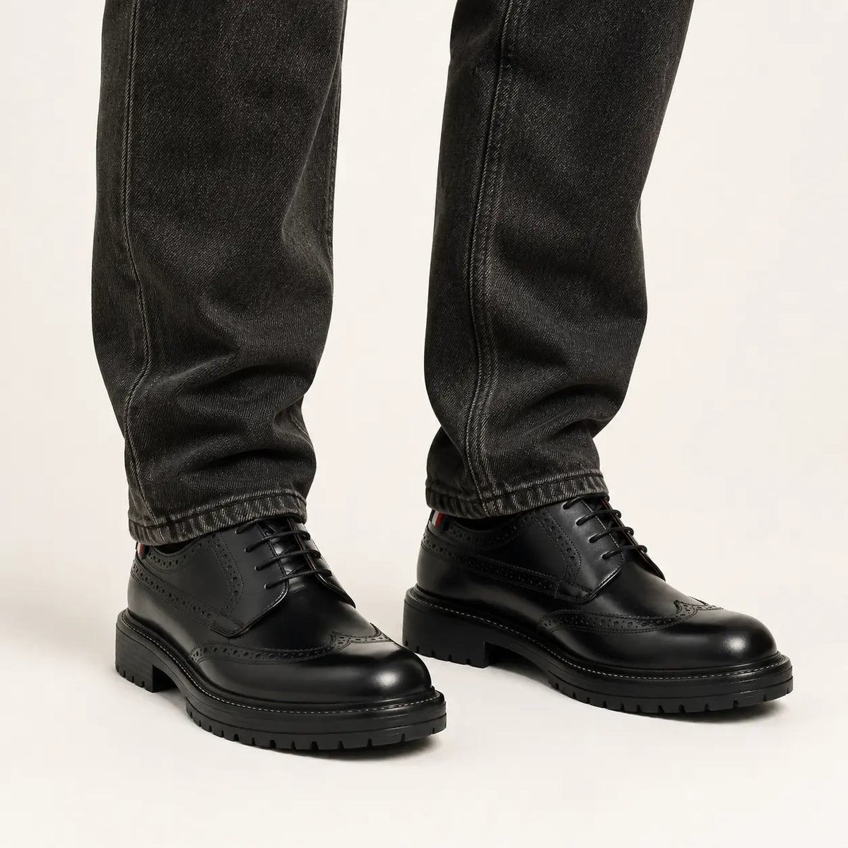 Black Chunky Brogue Derby — on-foot studio view