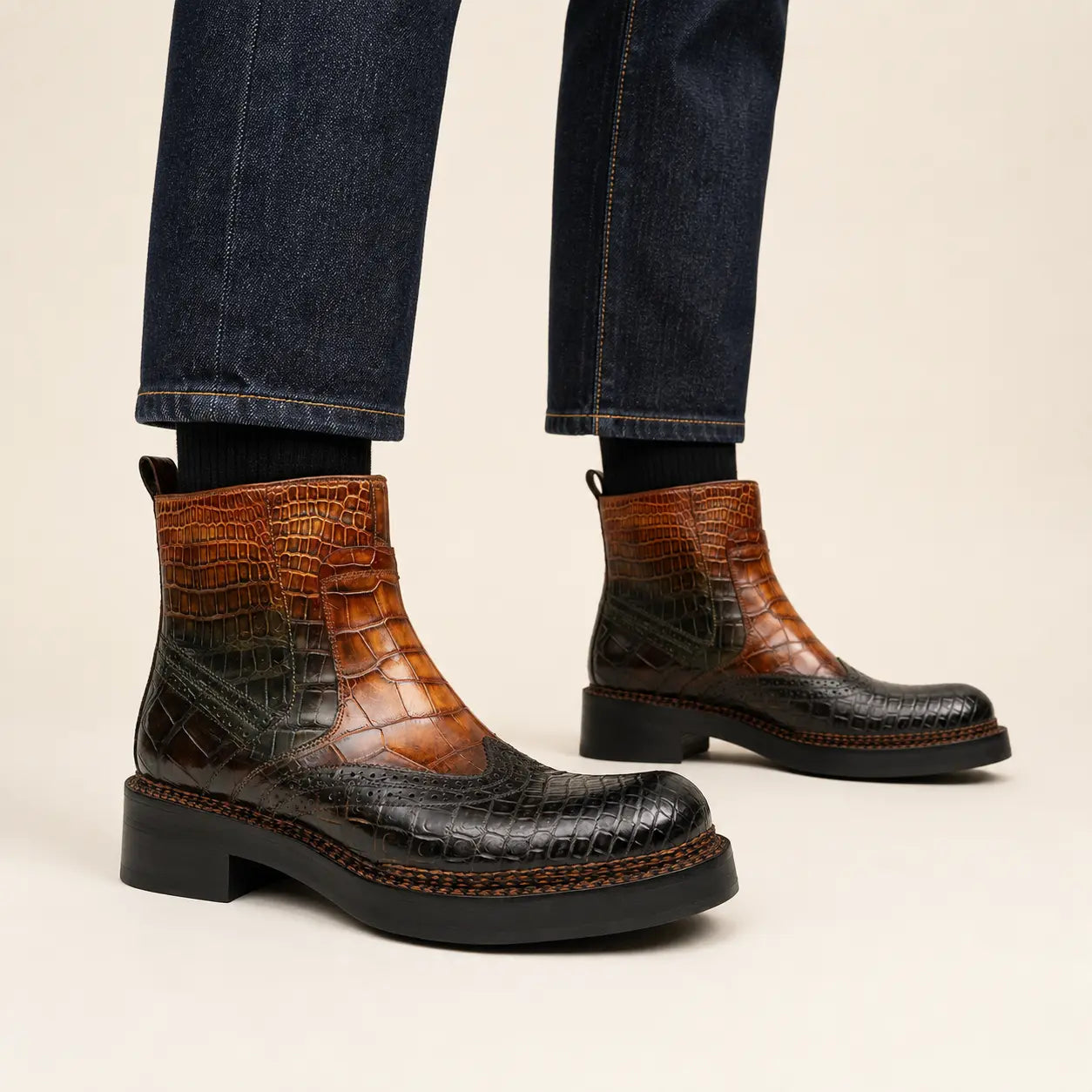 DIVINCH cognac-black crocodile pull-on boot on foot — warm studio side profile