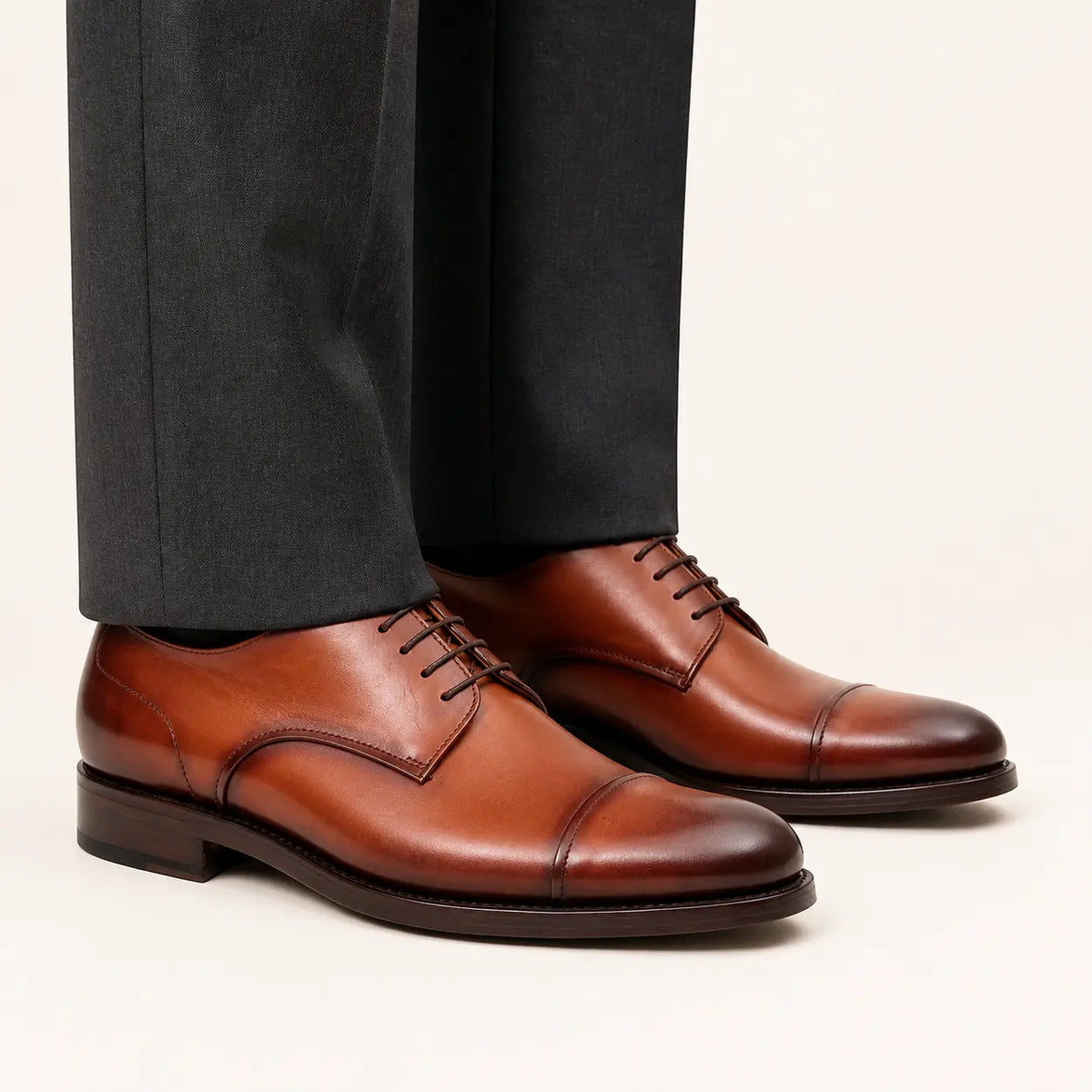 DIVINCH cognac cap-toe derby — on-foot studio view