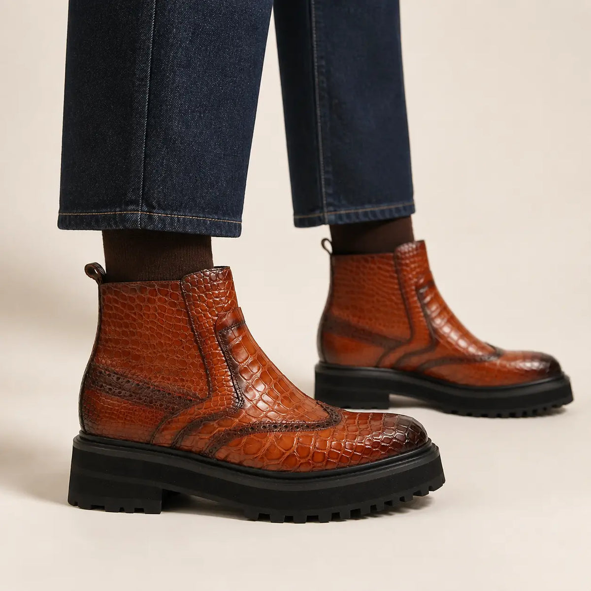 DIVINCH cognac crocodile Chelsea boot on foot — warm studio side profile