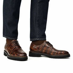 Cognac crocodile Norwegian welt Derby shoes on foot