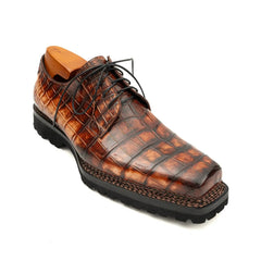 Derby en crocodile cognac à semelle crantée