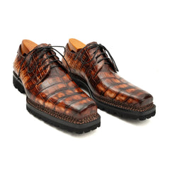 Derby en crocodile cognac à semelle crantée
